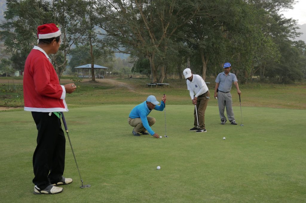 "santa" plays a few rounds of golf on Chriatmas Day at the Laiza Golf Club.  